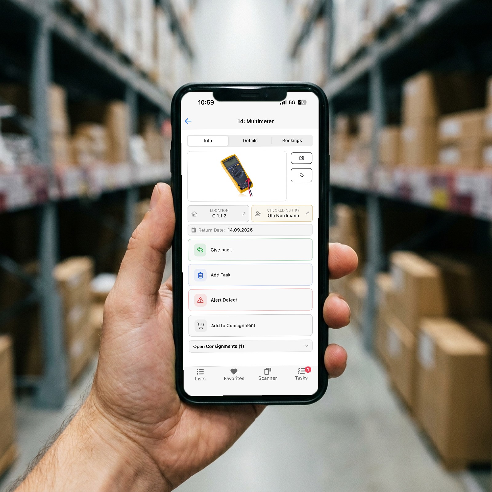 The mobile app showing a tool card with location, who checked it out, return date and the Give back button