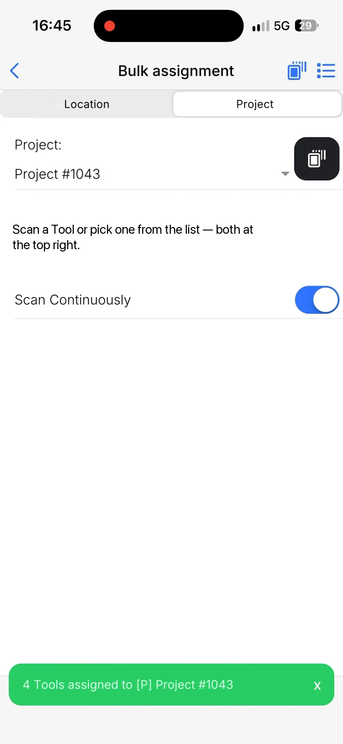 The confirmation 4 Tools assigned to [P] Project #1043 at the bottom of the screen